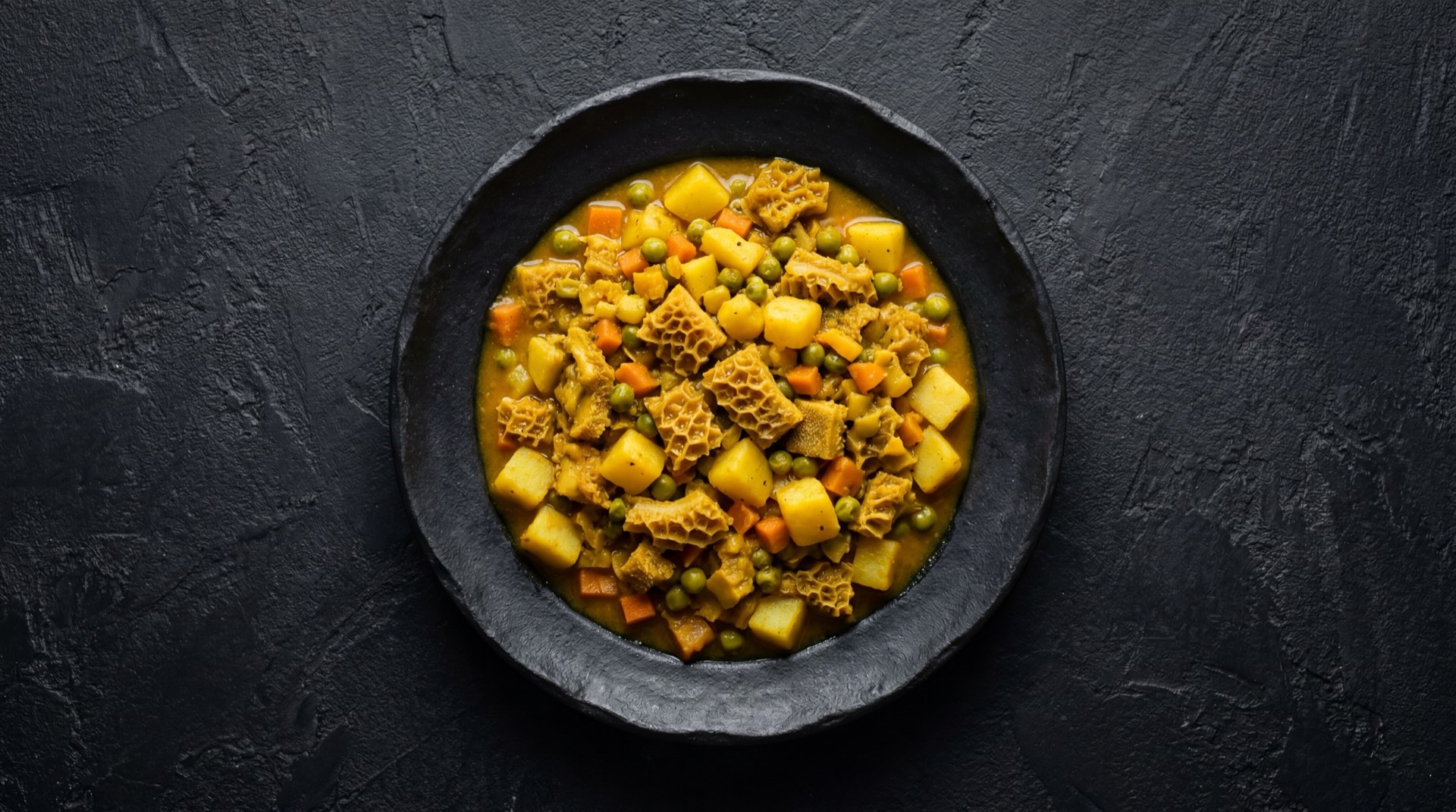 Cau cau peruano version saludable con pechuga de pollo en cubos en vez de mondongo y papas amarillas