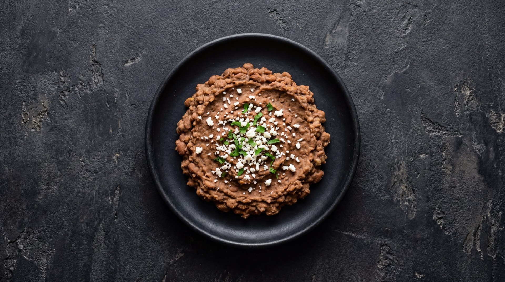 Frijoles refritos version saludable sin manteca de cerdo, con menos grasa y mas frijoles enteros