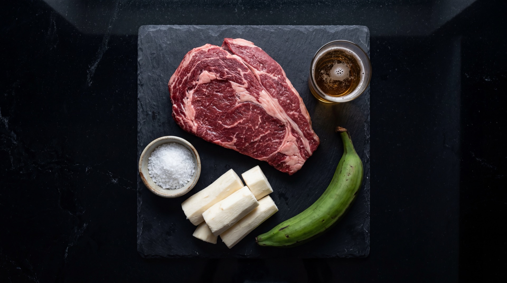 Porcion de mamona llanera servida con yuca, platano asado y aji llanero