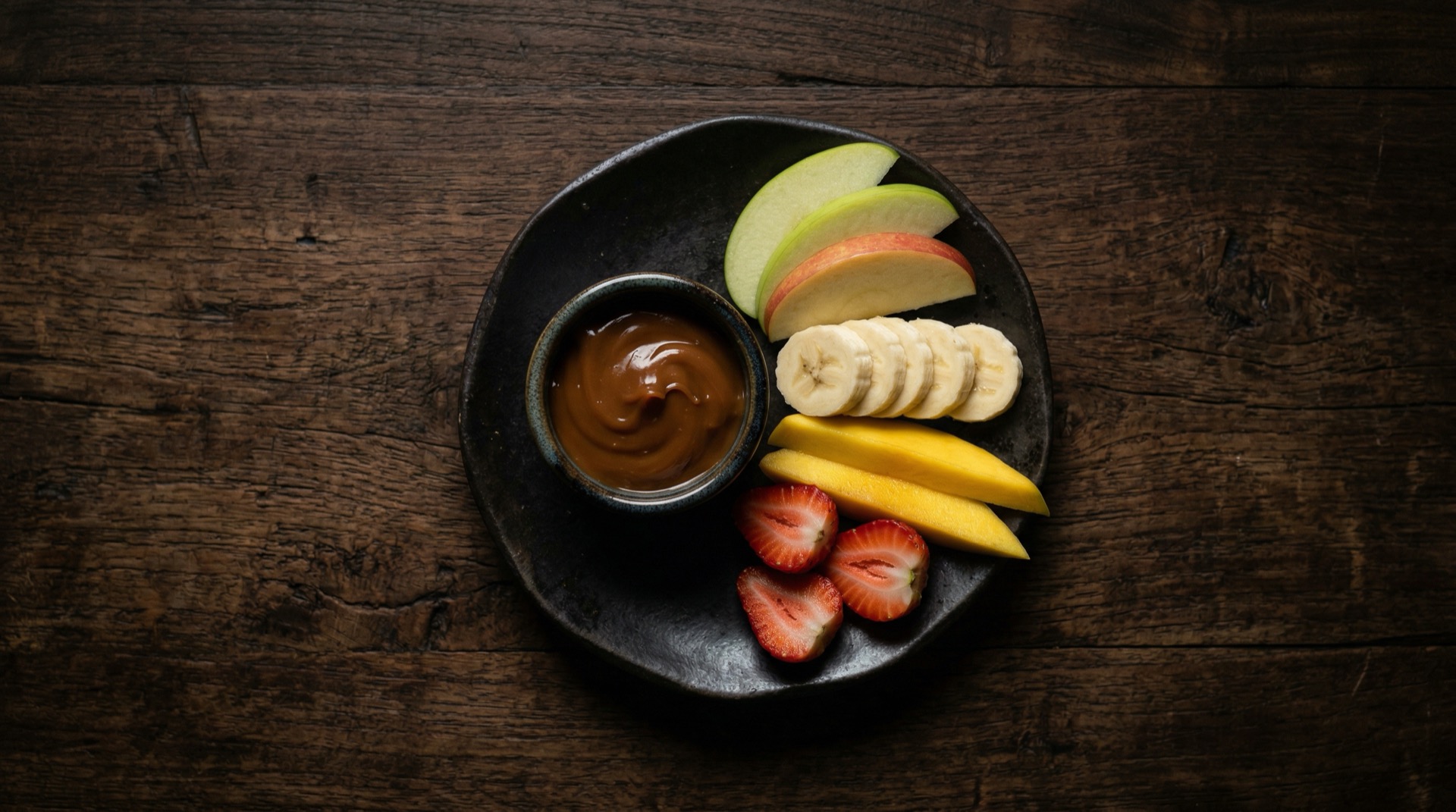 Porcion controlada de manjar con frutas como alternativa mas saludable